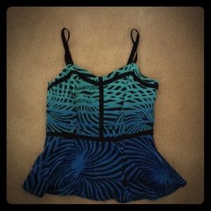 Peplum Tank with adjustable straps. Never worn.